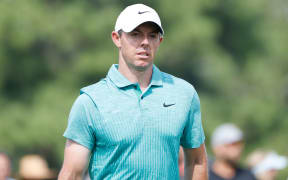 McIlroy says Reed is 'not living in reality'