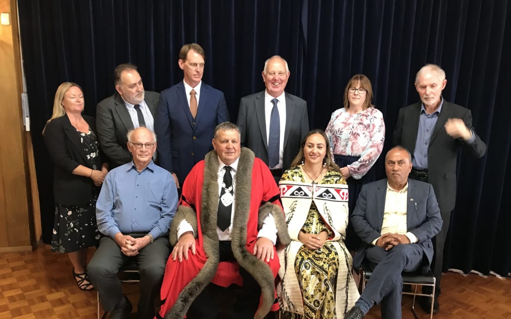 Kaipara Mayor Craig Jepson (centre in red robe) alongside Te Moananui Māori Ward councillor Pera Paniora.