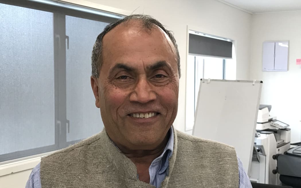 Kaipara District councillor Ash Nayyar, who was rescued from raging floodwaters along with his wife, and taken down the road clinging to the outside of a fire engine.