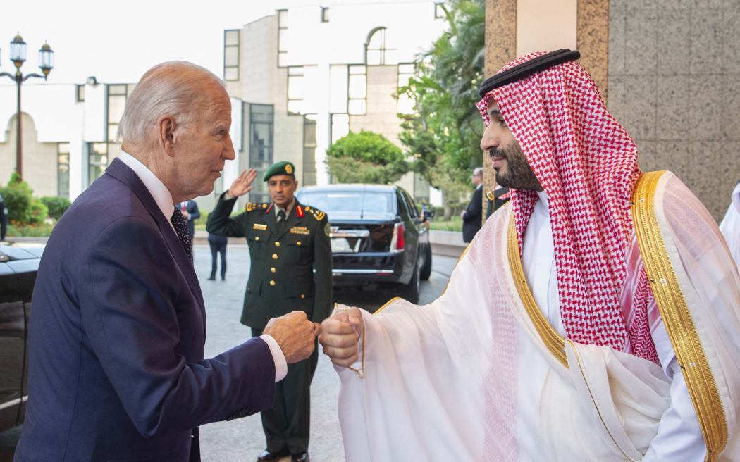 US President Joe Biden (L) being welcomed by Saudi Arabian Crown Prince Mohammed bin Salman (R) at Alsalam Royal Palace in Jeddah, Saudi Arabia on 15 July 2022.