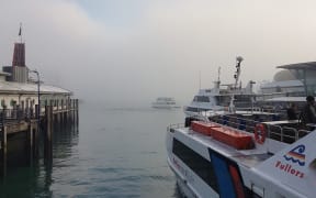 Fog in the harbour as seen from the Downtown Ferry Terminal.
