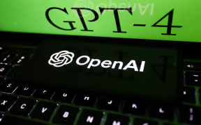 GPT-4 sign on website displayed on a laptop screen and OpenAI logo displayed on a phone screen are seen in this illustration photo taken in Poland on March 14, 2023. (Photo by Jakub Porzycki/NurPhoto) (Photo by Jakub Porzycki / NurPhoto / NurPhoto via AFP)