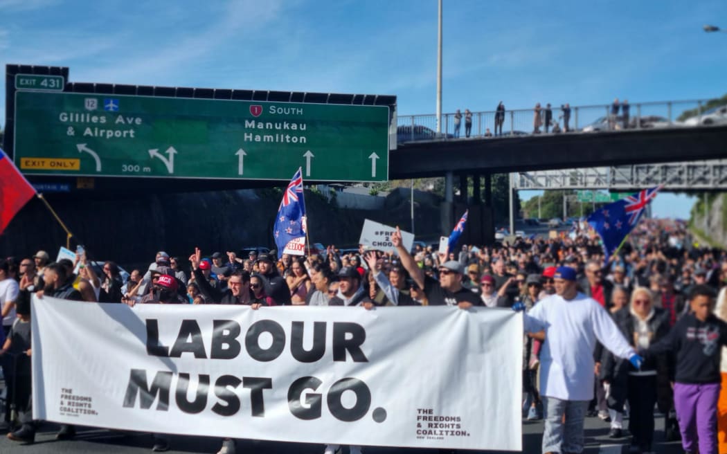 Marchers took over part of the Auckland motorway during a protest on Saturday. The march was organised by the Freedom and Rights Coalition, and protests were direct at a number of causes and authorities, including anti-vaccines, anti-lockdowns, and anti-politician, with the slogan: 