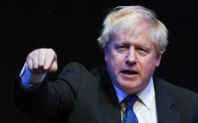 British Conservative Party politician Boris Johnson gives a speech during a fringe event on the sidelines of the third day of the Conservative Party Conference.