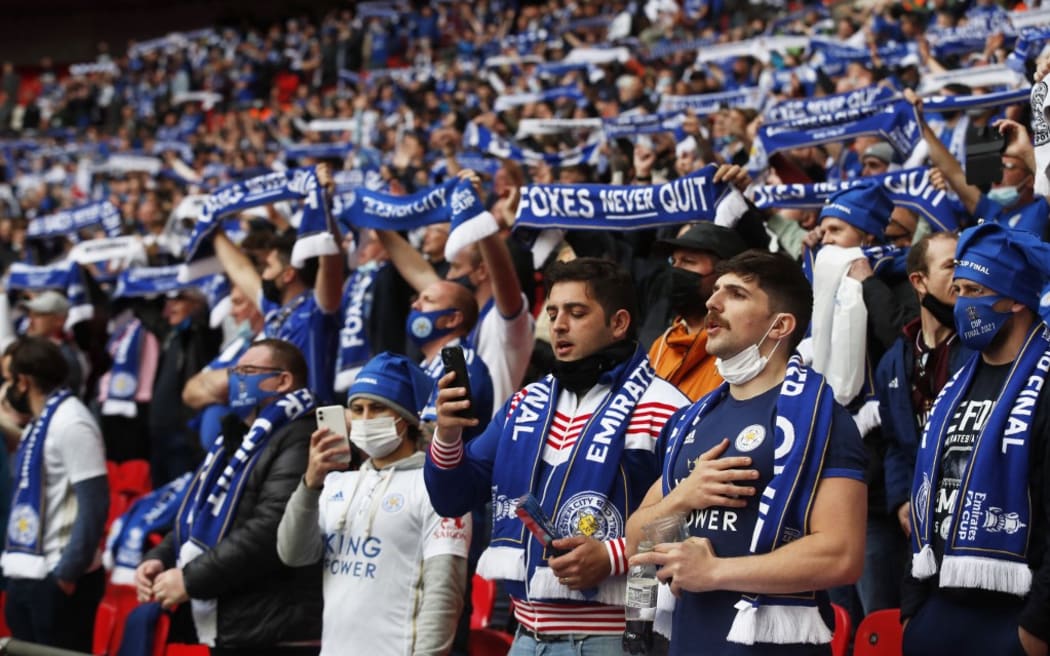 Leicester City fans cheer on their team ahead of the English FA Cup final football match between Chelsea and Leicester City at Wembley Stadium in north west London on May 15, 2021.