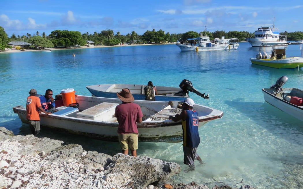 In this July 2017 photo, fishermen on Likiep Atoll gear up for a day of fishing around this isolated atoll in the northern area of the Marshall Islands.