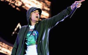 Eminem performs at Samsung Galaxy stage during 2014 Lollapalooza Day One at Grant Park on August 1, 2014 in Chicago, Illinois.