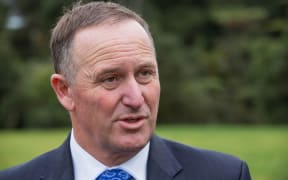John Key at a stand up with media. 8 July 2016.