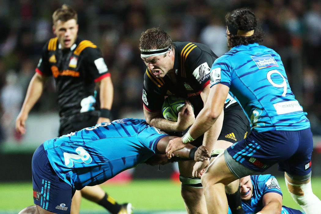 Chiefs captain Brodie Retallick goes on the charge against the Blues.