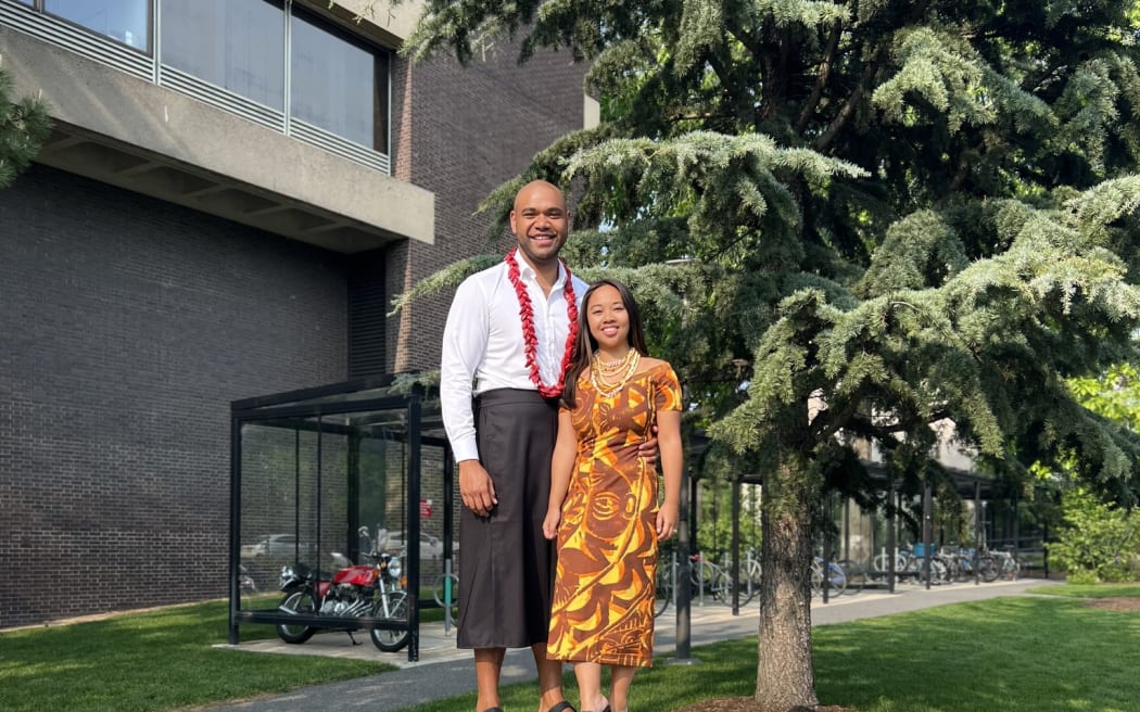 Joe Xulue poses with his wife Yasmin at Harvard University