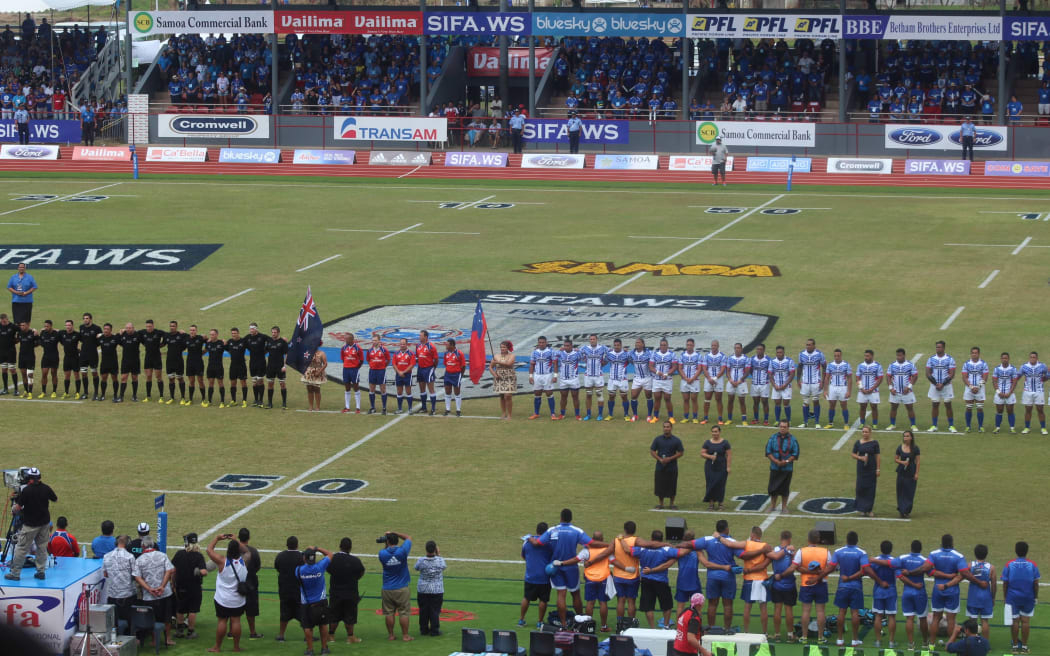 Manu Samoa and the All Blacks sing their respective national anthems at the stadium ahead of their rugby match in Apia