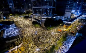 Protesters gather outside the headquarters of the Legislative Counsel in Hong Kong.