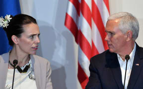 Prime Minister Jacinda Ardern and US Vice President Mike Pence speak at an electricity projects signing ceremony during the Asia-Pacific Economic Cooperation (APEC) Summit.