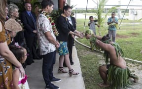 NZ Prime Minister Jacinda Ardern is welcomed to Niue with a Takalo, a traditional Niue war dance.