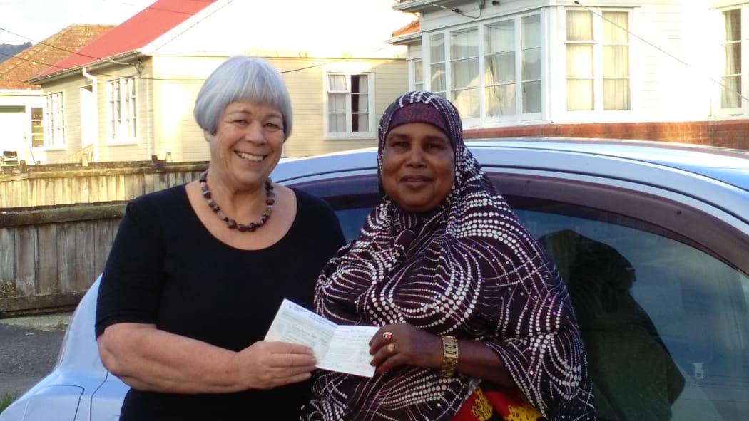 volunteer Janet (left) and driver Suldano (right) after Suldano passed her test.