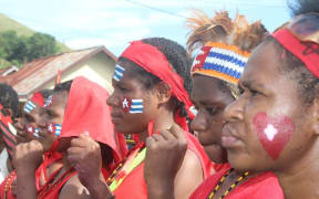 West Papuans demonstrating support for the Liberation Movement had the Papuan Morning Star flag emblazoned on body and garb.