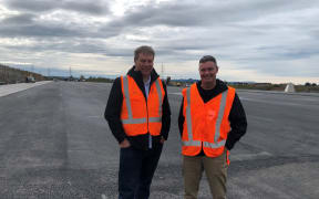 Chris Joblin and Dave Christie standing at the Ruakura Superhub construction site
