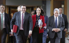 Grant Robertson, Jacinda Ardern, Winston Peters and James Shaw leave the budget lock-up.