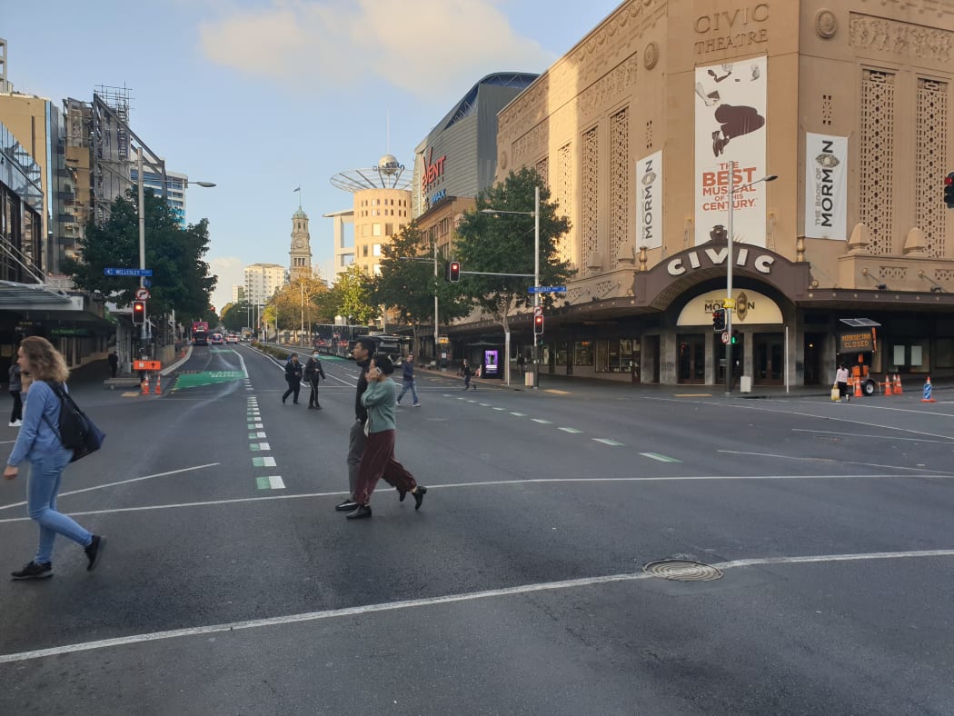 Few people were at Queen St's usually busy intersection after the country moved into alert level 3 to battle the Covid-19 pandemic.