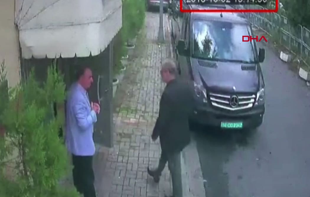 CCTV footage obtained from Turkish news agency DHA shows Saudi journalist Jamal Khashoggi (R) arriving at the Saudi Arabian consulate in Istanbul on 2 October, 2018.