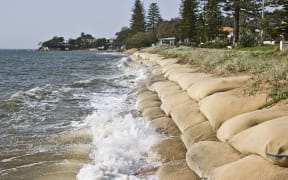 Erosion caused by rising sea levels due to global warming.