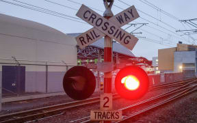 Two people injured after car collides with train in Invercargill