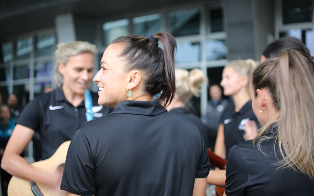 Football Fern Ali Riley and her teammates practice waiata outside Spark Arena, Auckland.