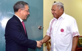 Fiji Prime Minister Frank Bainimarama receives Guangdong Provincial Party Secretary, Mr Hu Chunhua, in Suva in June 2015