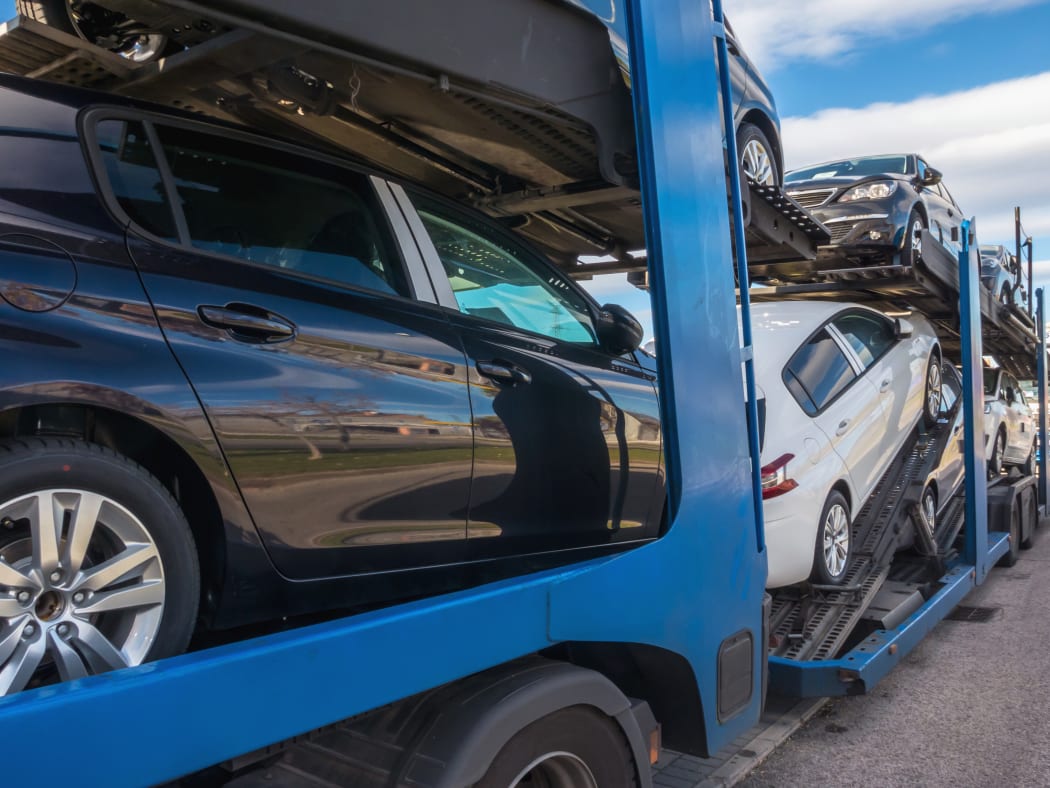 Some cnew cars in a car transport. Truck car carrier