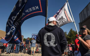 A person wears a QAnon sweatshirt during a pro-Trump rally on October 3, 2020 in the borough of Staten Island in New York City.
