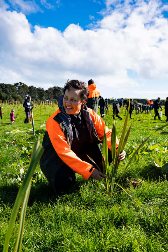 Conservation minister Kiri Allan helped planting at the Waiwhakaiho River