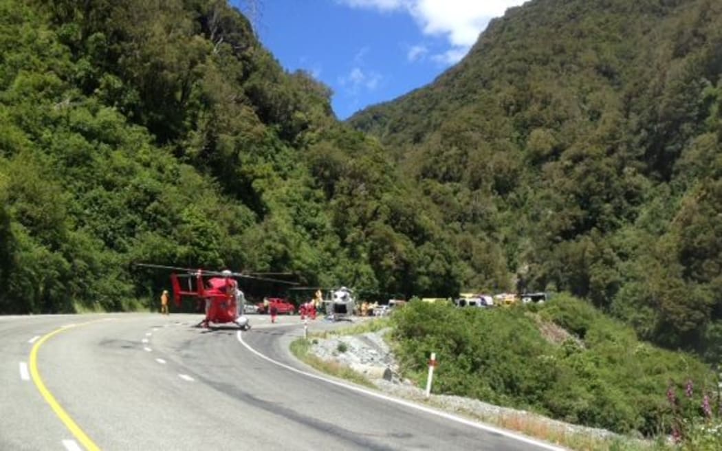 Rescue helicopters at the scene of the crash in the Otira Gorge.