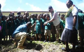 Fiji President Jioje Konrote (with cap) with children and government officials during the launch of his Tree Planting Initiative on Rotuma Island.