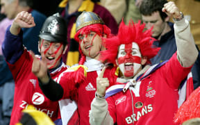 British and Irish Lions fans celebrating their team's victory against Taranaki in New Plymouth during their tour of New Zealand in 2005.