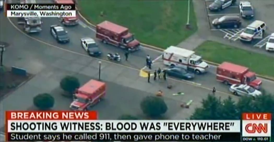 A video grab courtesy of CNN and KOMO TV News shows police and ambulances at Marysville-Pilchuck High School.