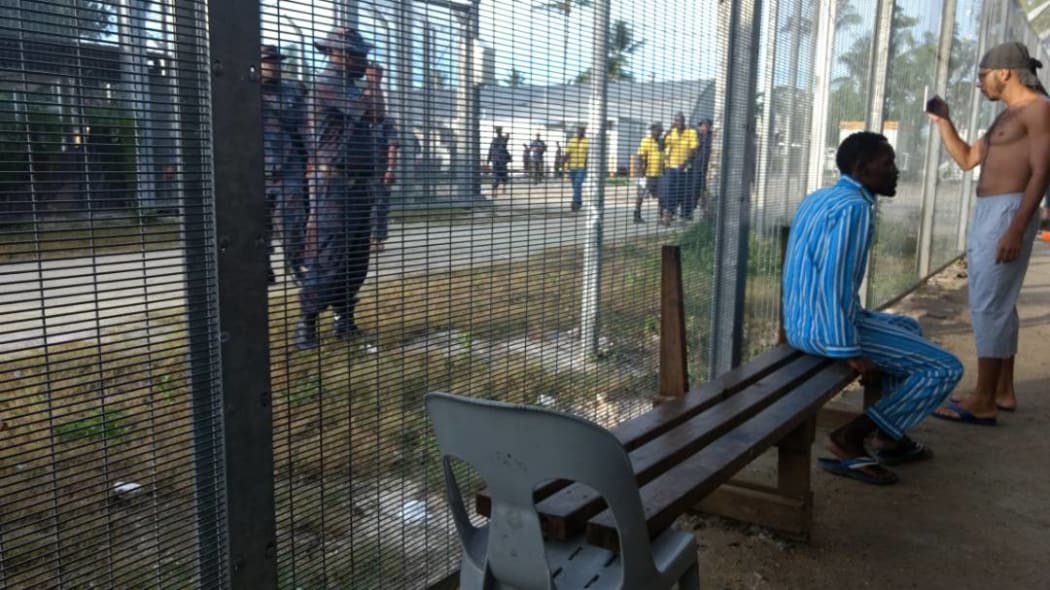 Manus Island detainees and security.