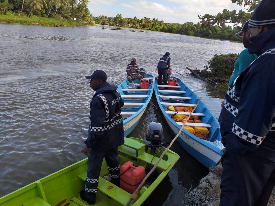 Police and Maritime Safety officers seize the boats at Nasali Landing in Rewa.