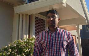 Economist, Shamubeel Eaqub, outside his rented home in Auckland.