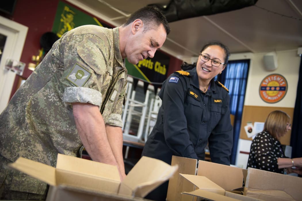 About 40 schoolchildren, veterans, staff from Foodstuffs and Z Energy, and New Zealand Defence Force personnel packed hundreds of Christmas treats this morning for NZDF personnel serving overseas.