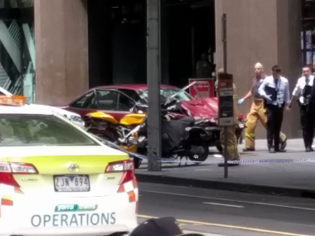 Police in Melbourne have arrested a man after a car hit pedestrians in the city centre, killing three people and injuring at least 20.