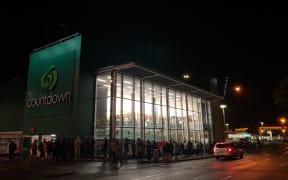 People queuing up at Countdown in Quay St, Auckland CBD