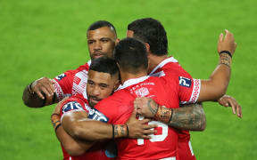 The Tonga Invitational XIII celebrate beating Great Britain.
