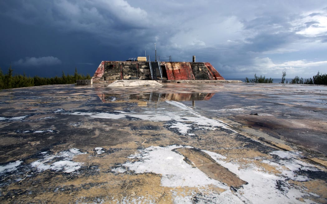 A picture shows a general view of the hard-surfaced advanced recording base PEA "Denise" in the north zone of the Moruroa (Mururoa) atoll, southern Pacific ocean, where French forces have conducted 138 nuclear weapon tests until 1996, on February 13, 2014.