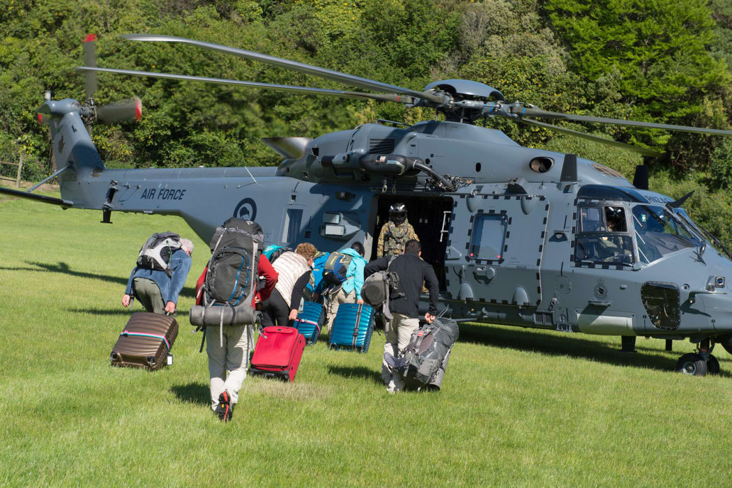 Four NZDF NH90 helicopters and commercial helicopters were helping evacuate tourists from the town.