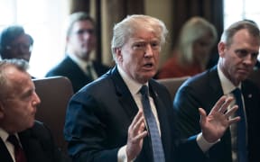 President Donald Trump said "major decisions" would be made on a Syria response in the next day or two, after warning that Damascus would have a "big price to pay" over an alleged chemical attack on a rebel-held town.