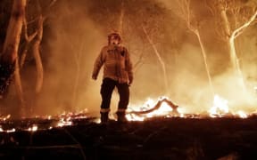 Canterbury University student fighting Australian bush fires Fergus Simpson in the midst of one of the blazes.