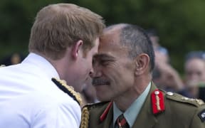 Prince Harry receives a hongi from Sir Jerry Mateparae.