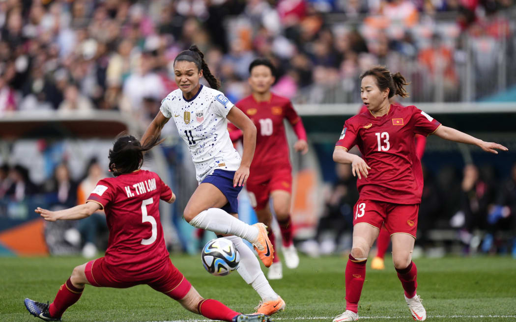 Sophia Smith of USA and Portland Thorns and Le Thi Diem My of Vietnam and Than Khoang San compete for the ball during the FIFA Women's World Cup Australia &amp; New Zealand 2023 Group C match