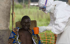 An man is treated for Ebola in The Democratic Republic of Congo.
