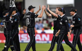 NZ players celebrate the wicket of Morgan.
ICC Cricket World Cup FINAL.